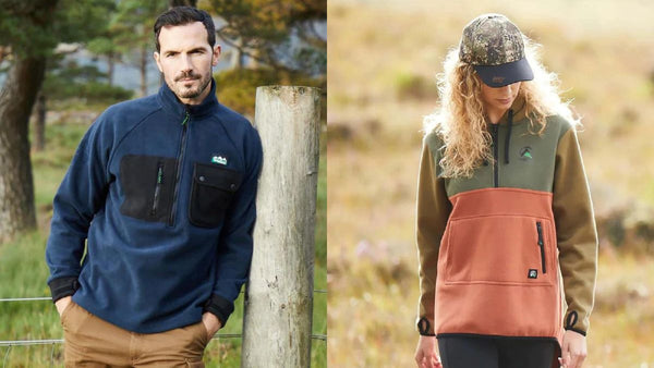 Man and woman wearing Ridgeline clothing out in the countryside