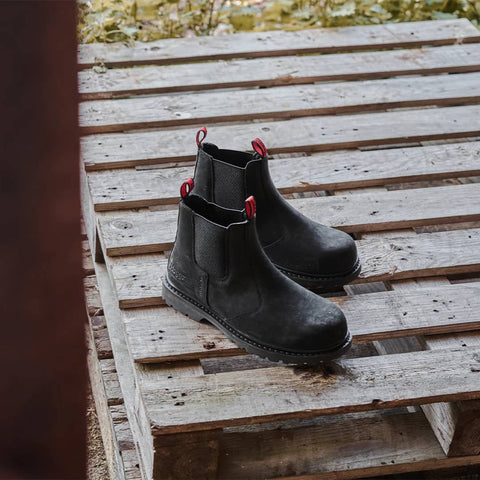 Hoggs of Fife Zeus Safety Dealer Boots in black on a wooden background