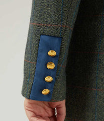 Close up of button detail on ladies tweed jacket
