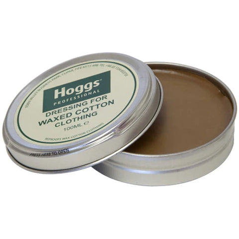 An open tin of Hoggs of Fife Professional Waxed Cotton Dressing against a white background