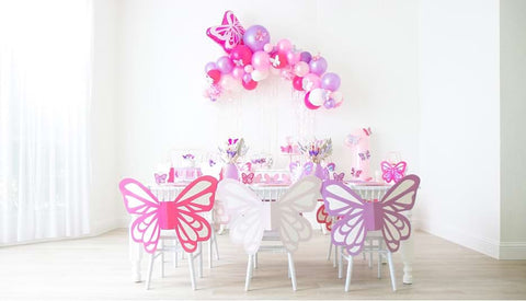 Butterfly-themed third birthday party decorations