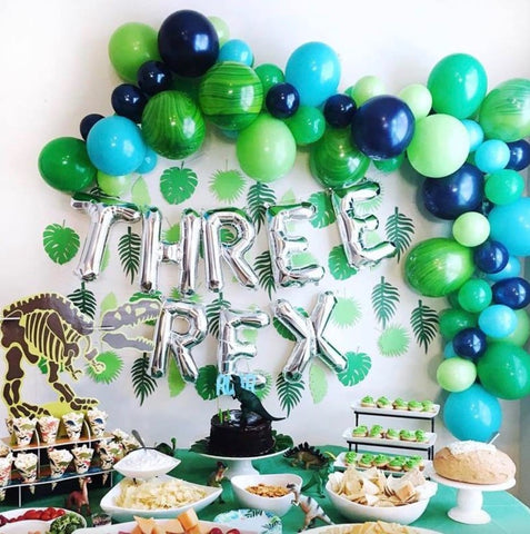 Three-rex dinosaur-themed third birthday party