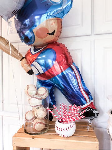 Baseball-themed third birthday party decor