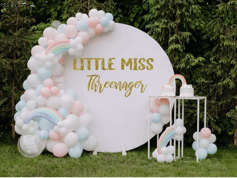 Threenager-themed third birthday party balloons and decor