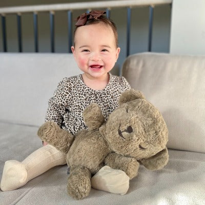 smiling baby with SNOObear