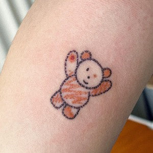 Tattoo ideas for parents: child's lovey tattoo