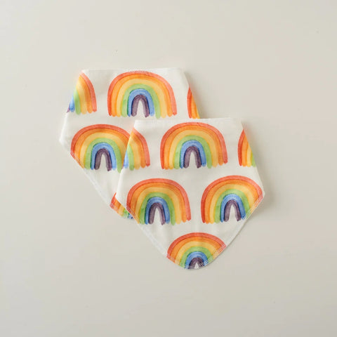 Stina and Mae baby bibs with handpainted rainbow design