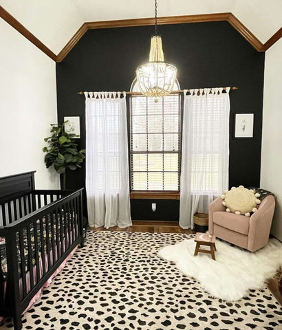 An opulent black baby nursery