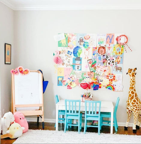 Bulletin board decorated with child's artwork