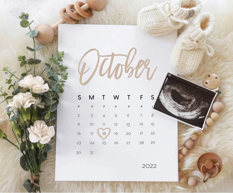 Pregnancy announcement template that prominently features a calendar with Baby's due date