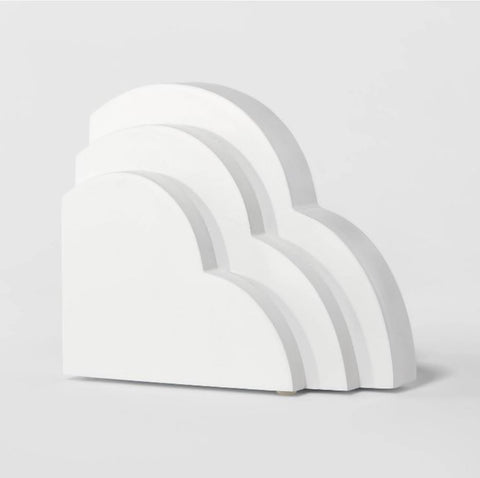 Cloud-shaped bookends for a nursery
