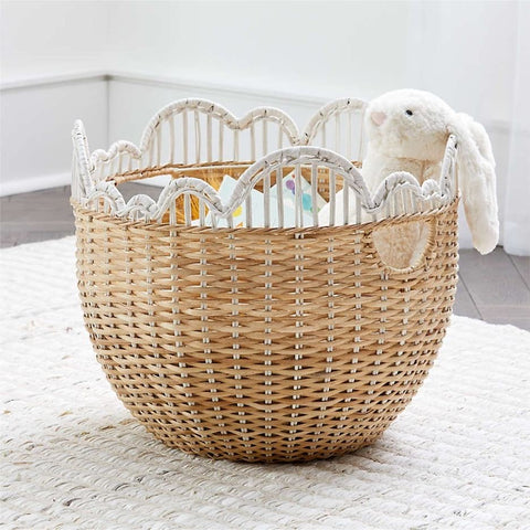 Floor basket with white scalloped edges that resemble a cloud