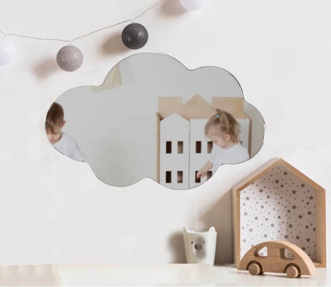 Cloud-shaped mirror in a child's nursery