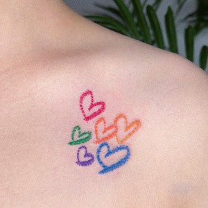 Tattoo ideas for parents: Crayon hearts tattoo