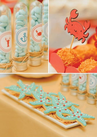 Ocean-themed first birthday party treats, including starfish-shaped sugar cookies.