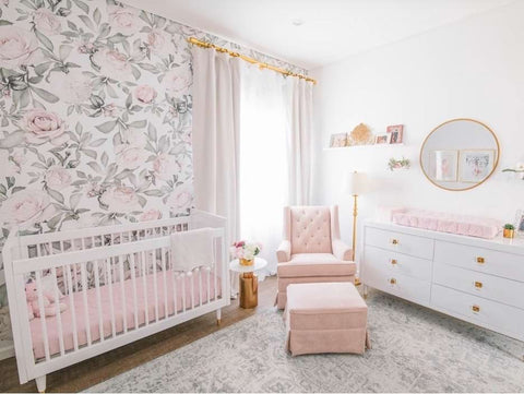 Floral nursery featuring blush and gold decor