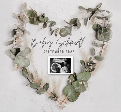 Pregnancy announcement template featuring a greenery heart
