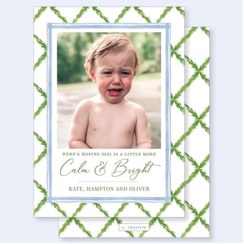 Holiday card photo of a crying toddler