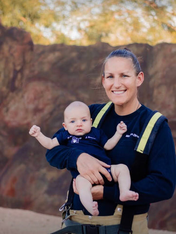 Morgan Dresser: Firefighter mom holding infant