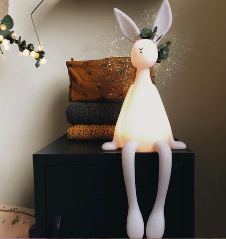 A light-up rabbit perched in a nursery