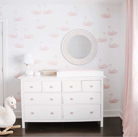 Baby nursery with pink wall decals
