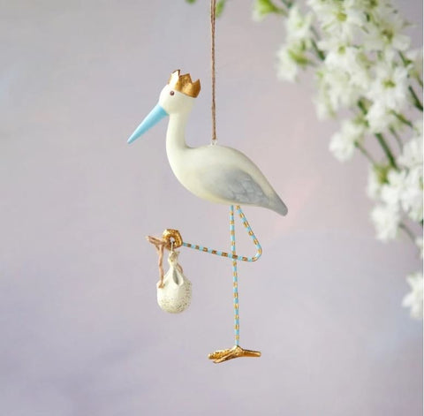 A stork ornament used to announce a pregnancy