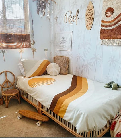 Surf-themed toddler room with an orange and brown retro-looking color scheme.