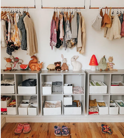 Open wardrobe in a shared kids' room