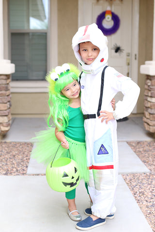 Alien and astronaut sibling Halloween costumes