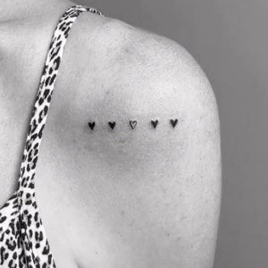 Parent tattoo ideas: row of hearts