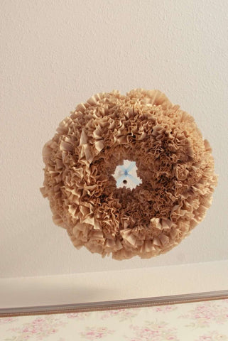 Nursery mobile made from upcycled coffee filters