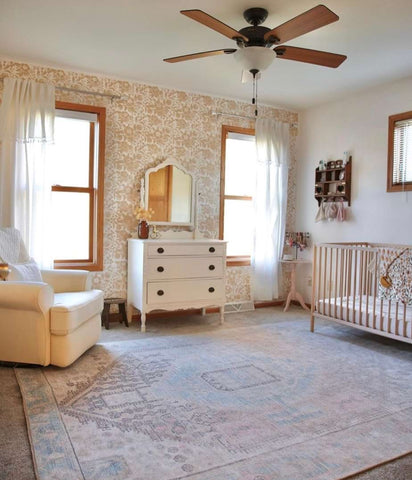 Vintage nursery with wall stenciling