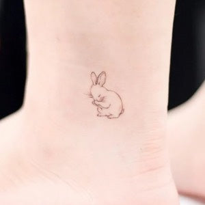 Parent tattoo ideas: Year of the rabbit tattoo for parents