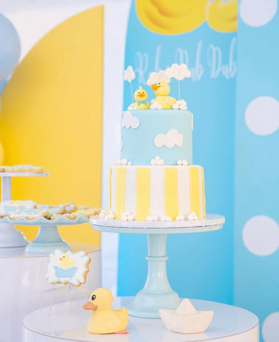 Baby shower cake decorated with rubber duckies