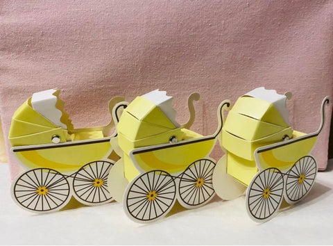 Baby shower favor holders that look like yellow baby carriages