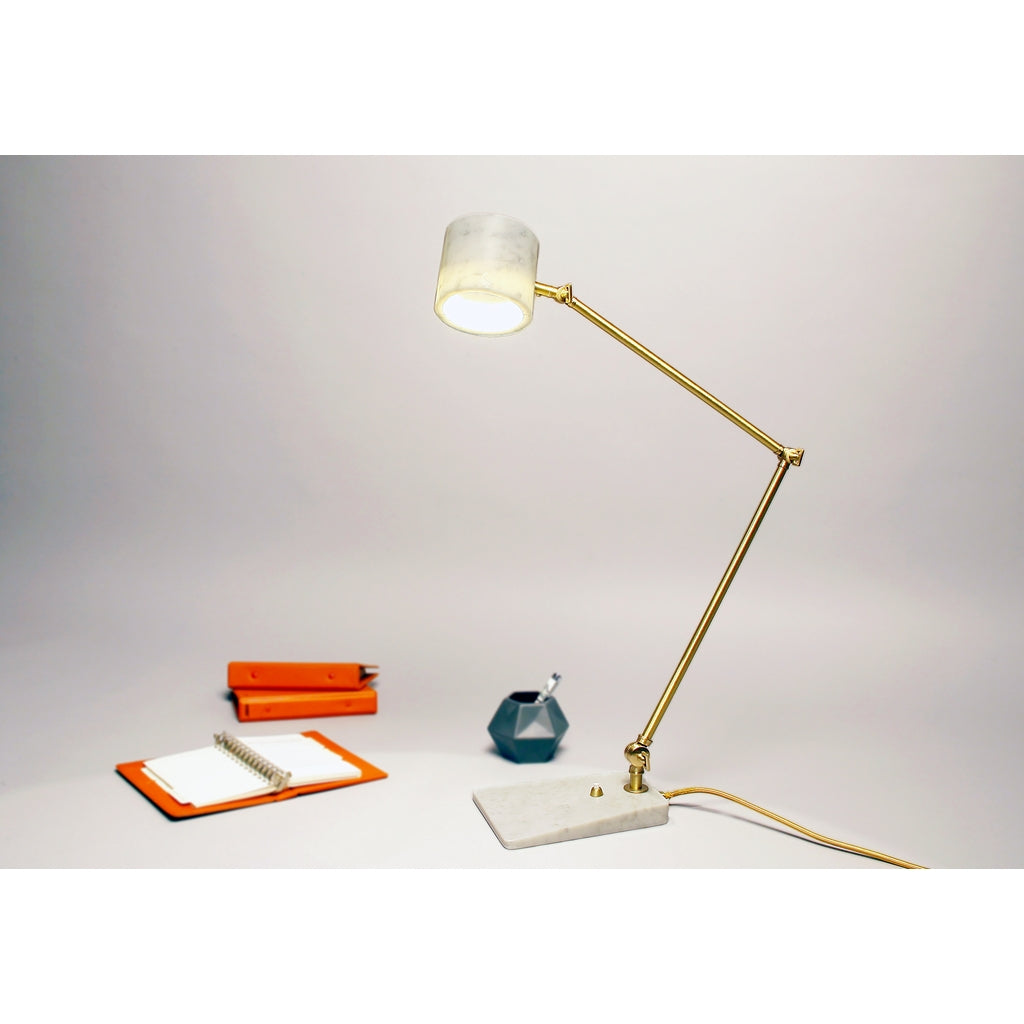 white and brass desk lamp