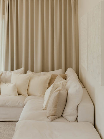 ripplefold curtains with cloud sofa