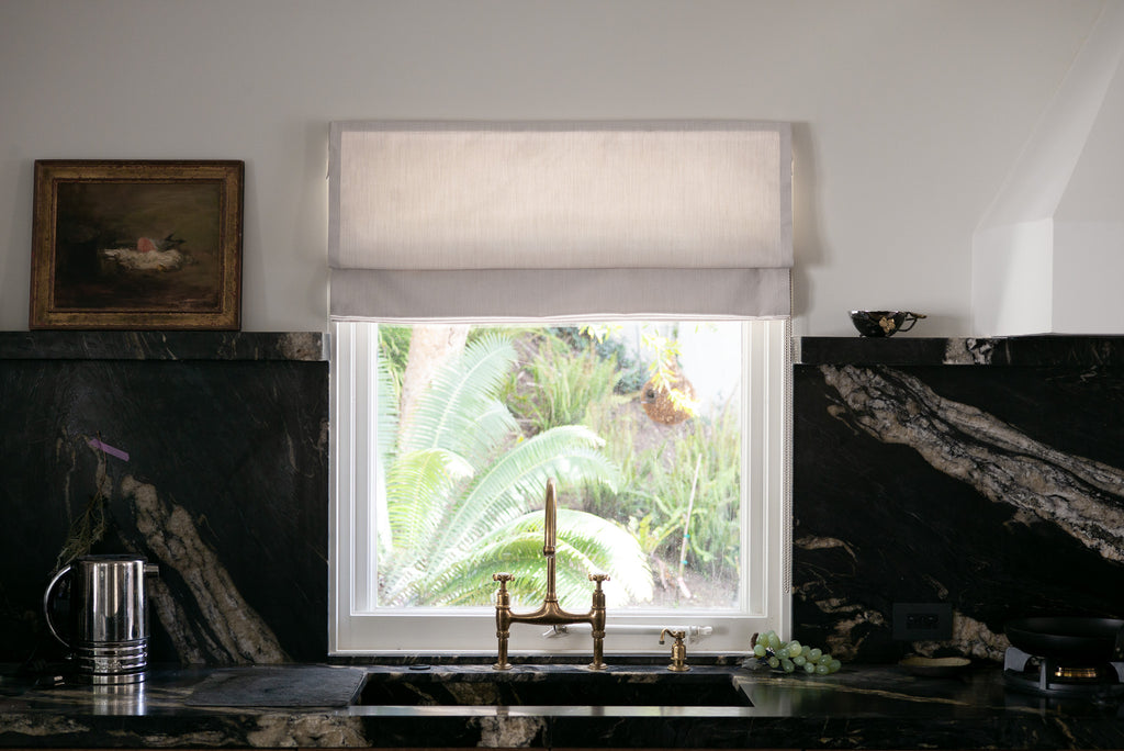 Roman shade in ultra mineral by loft curtains