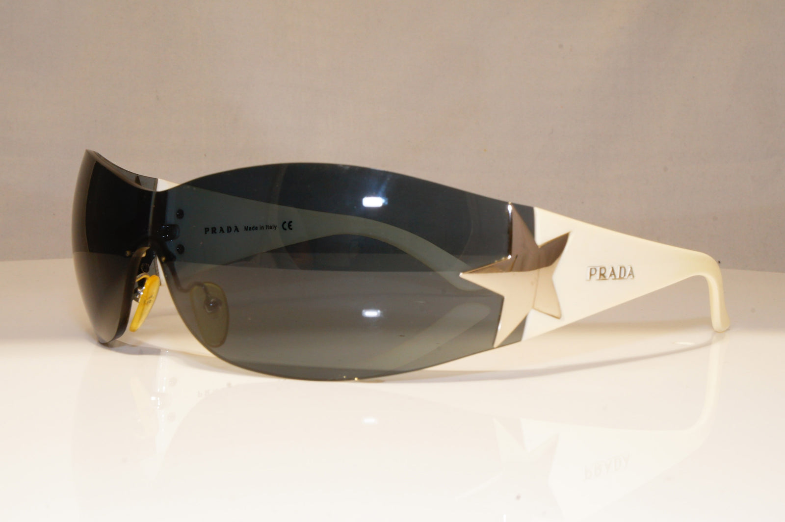 PRADA Mens Womens Sunglasses White Shield SILVER STAR SPR 72G 4AO-1A1 –  SunglassBlog