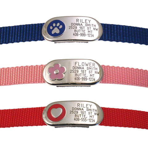 4 different metal collar tags with colorful enamel and design on front, attached flat to collars