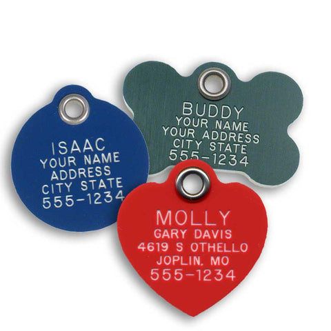 blue round plastic tag, green bone shaped plastic tag, and red heart shaped plastic tag, all engraved