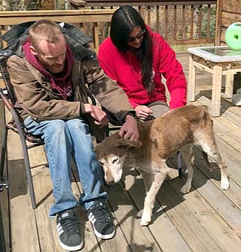 A couple and their rescued dog.