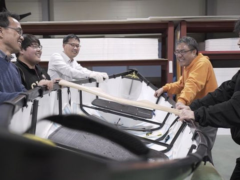 designers inspect mycanoe foldable canoe
