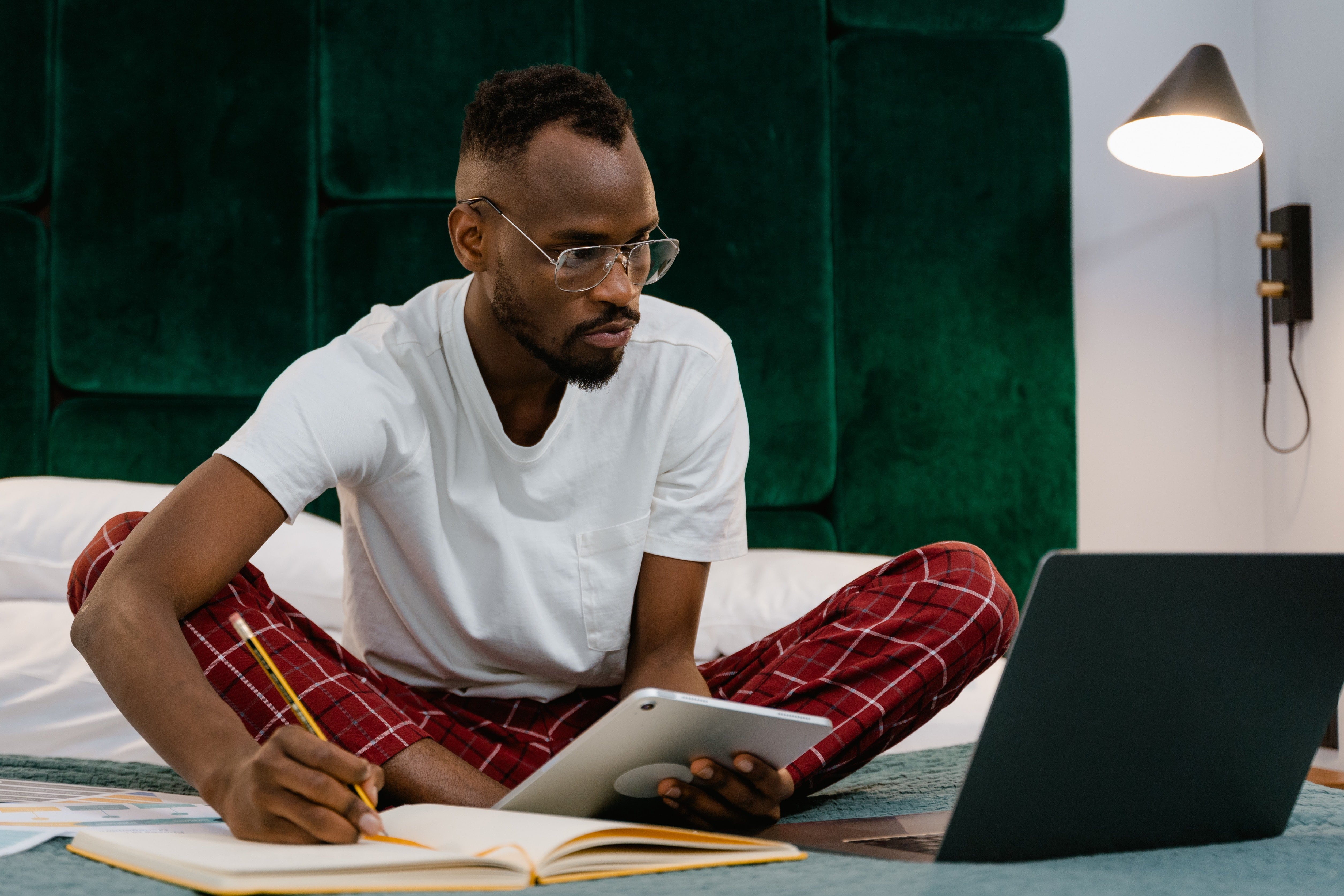 Image of a man in pyjamas on bed