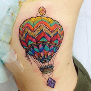 Tiny Hot Air Balloon Tattoo On Wrist