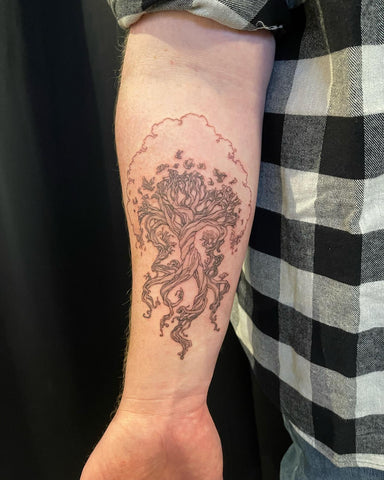 Tree of Life tattoo on forearm