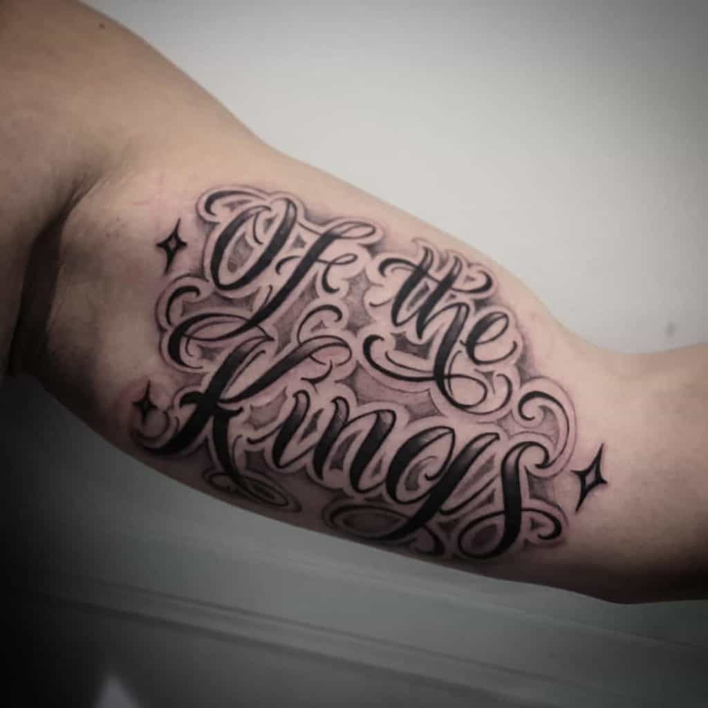 Los Angeles Lakers lettering tattoo on the bicep