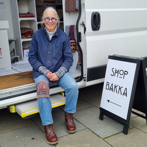 Mary sitting at the entrance to the BAKKA van.
