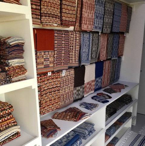 Fair Isle textiles displayed in the interior of the van.
