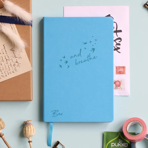 And Breathe personalised notebook in blue, personalised with a name.